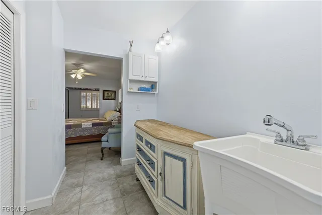 a view of a hallway with a flower pot