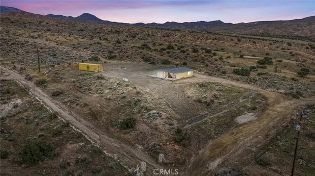 a view of a mountain with a outdoor space