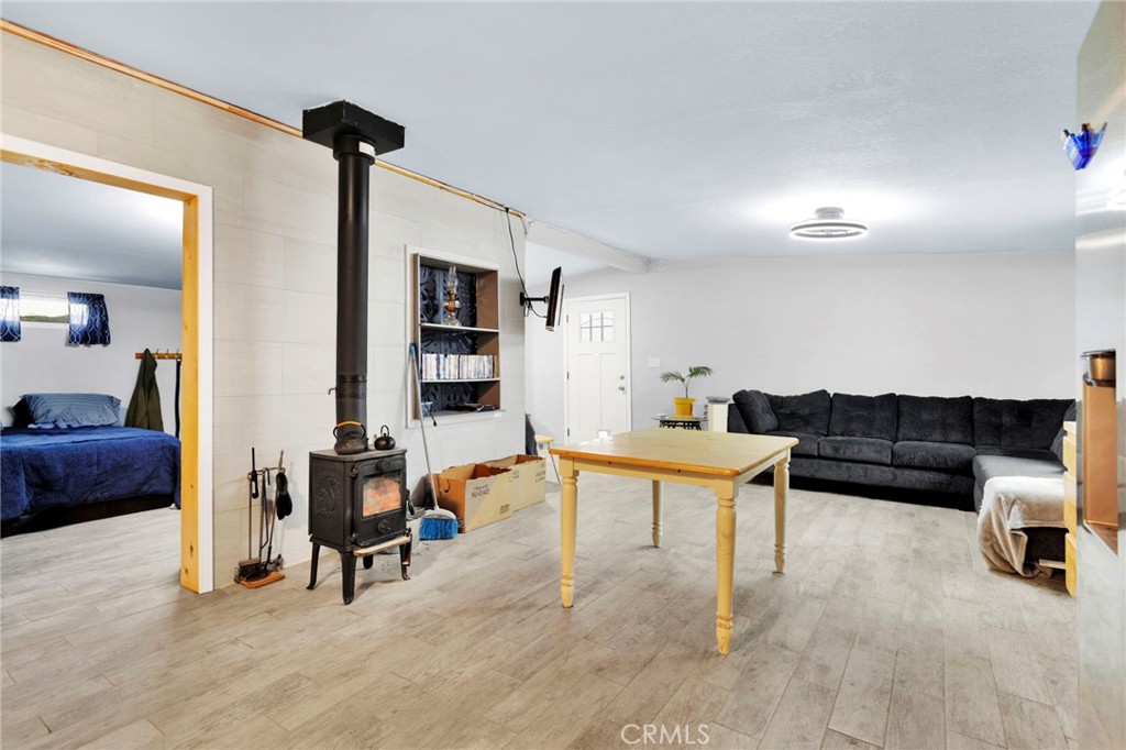 25333 Valley View Road Apple Valley, CA 92308 - Photo 11 of 37 a living room with furniture and a table