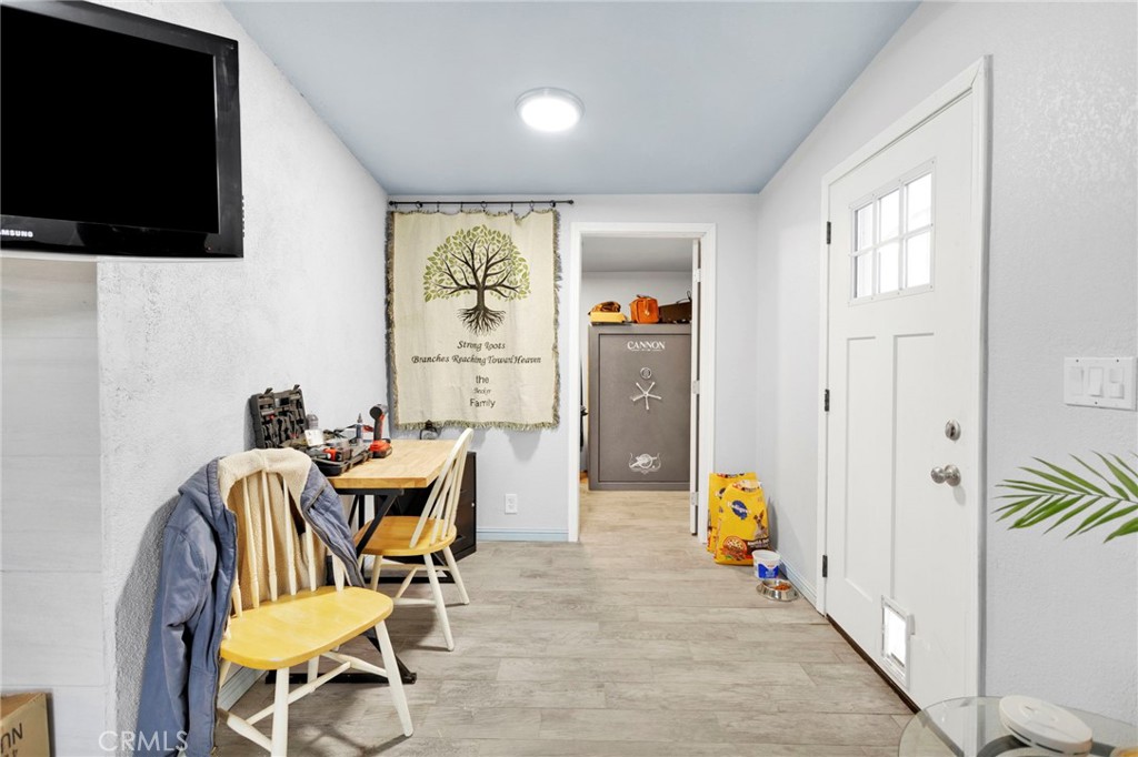 25333 Valley View Road Apple Valley, CA 92308 - Photo 12 of 37 a view of a livingroom with furniture and a flat screen tv