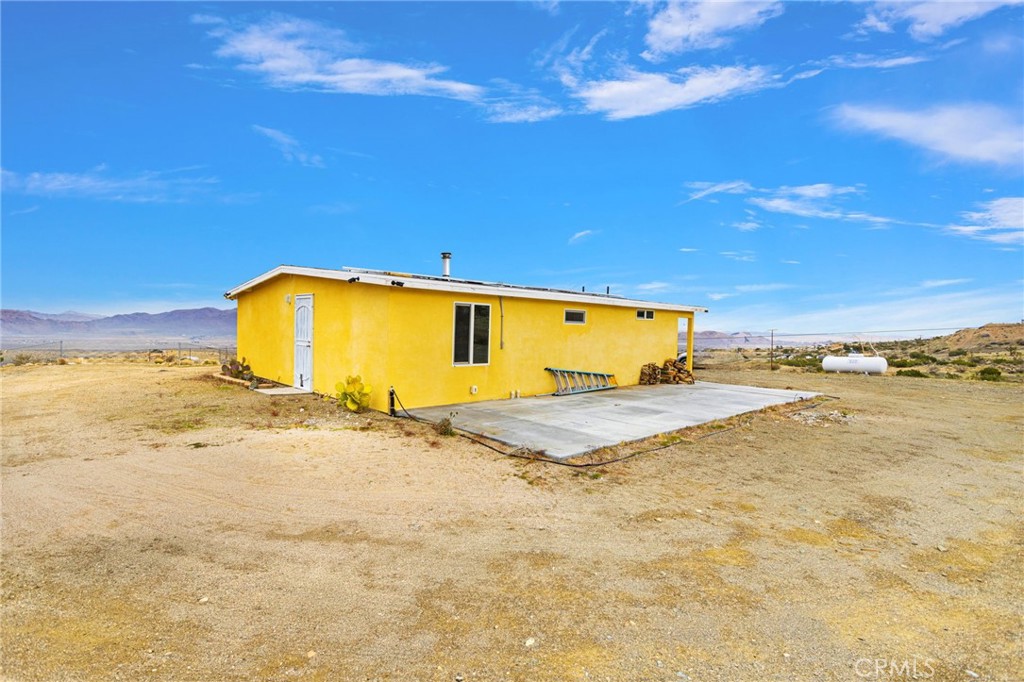 25333 Valley View Road Apple Valley, CA 92308 - Photo 25 of 37 a view of a swimming pool and an outdoor space