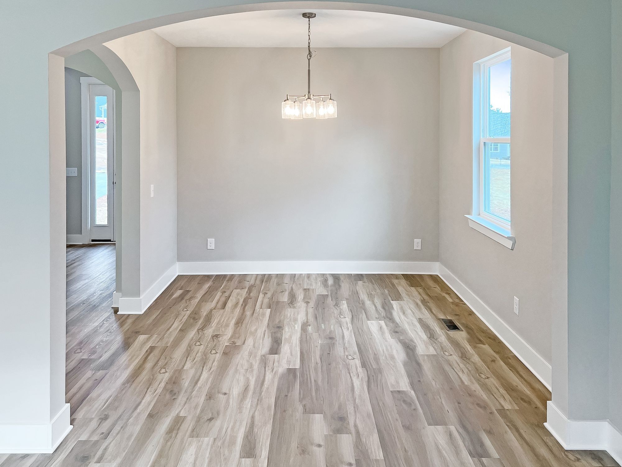 5140 Starks Road Cross Plains, TN 37049 - Photo 8 of 17 a view of empty room with wooden floor and fan
