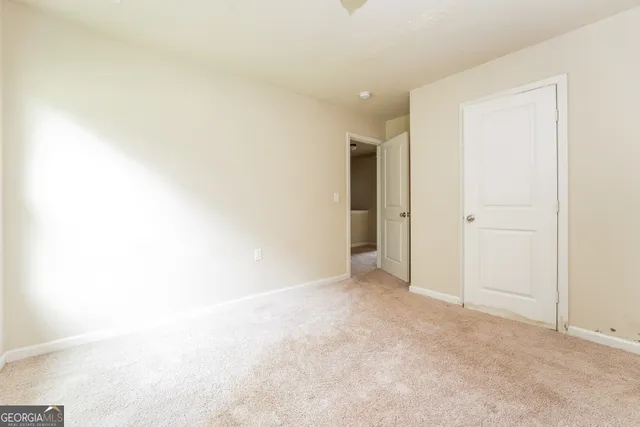 an empty room with an entryway