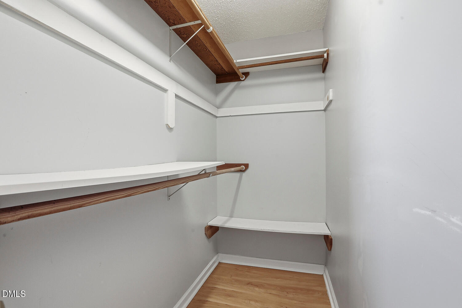 1220 Stoneferry Lane Raleigh, NC 27606 - Photo 19 of 40 a view of an empty walk in closet