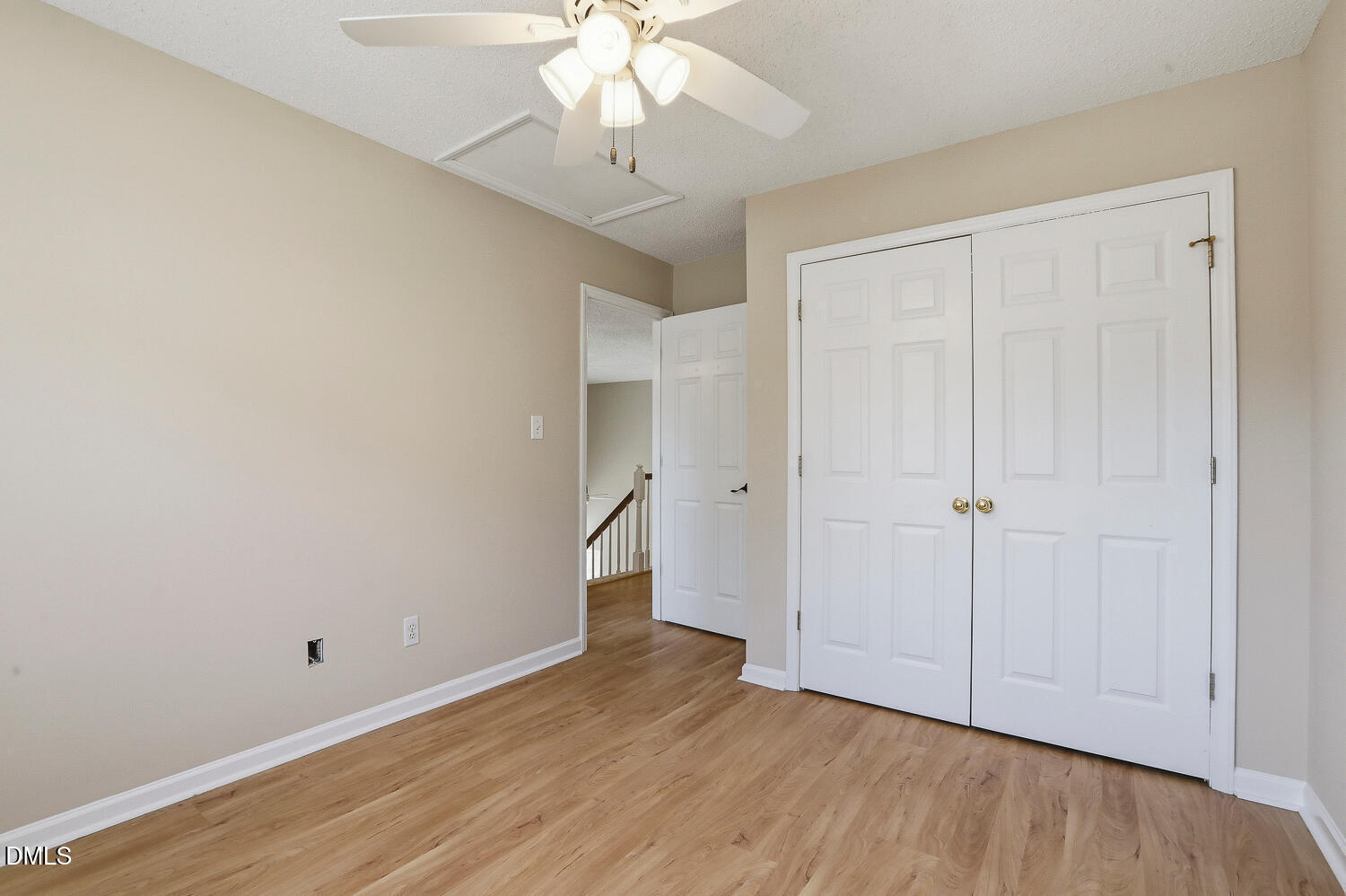 1220 Stoneferry Lane Raleigh, NC 27606 - Photo 23 of 40 a view of an empty room with wooden floor