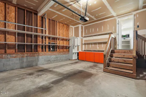 a balcony with wooden floor and fence