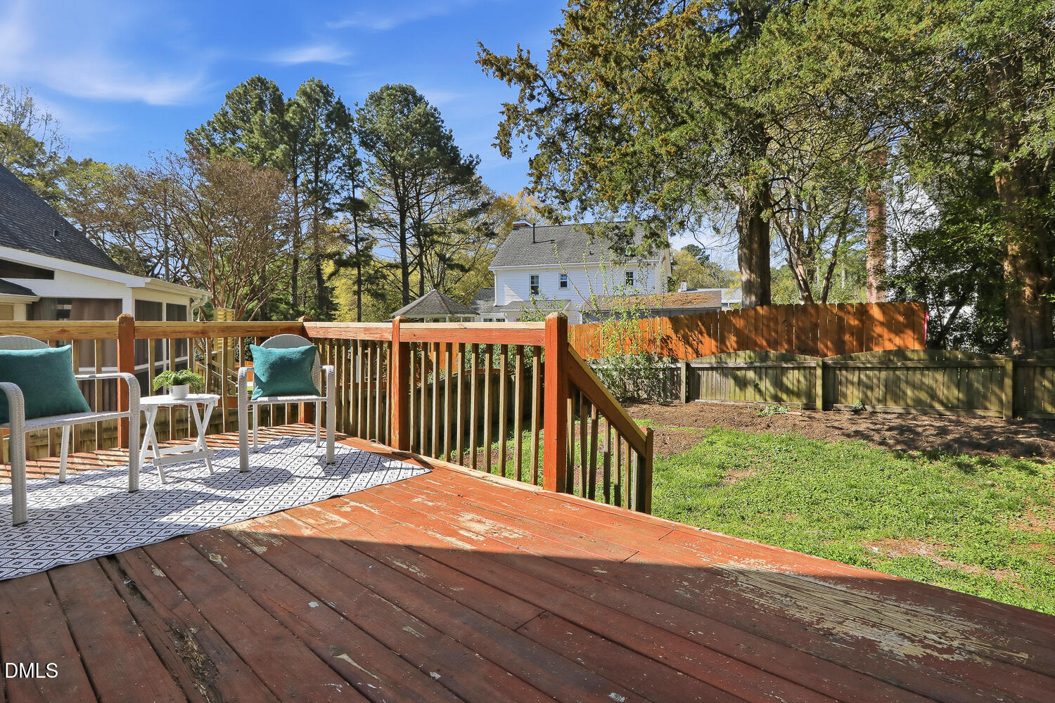 1220 Stoneferry Lane Raleigh, NC 27606 - Photo 26 of 40 a balcony with wooden floor and fence