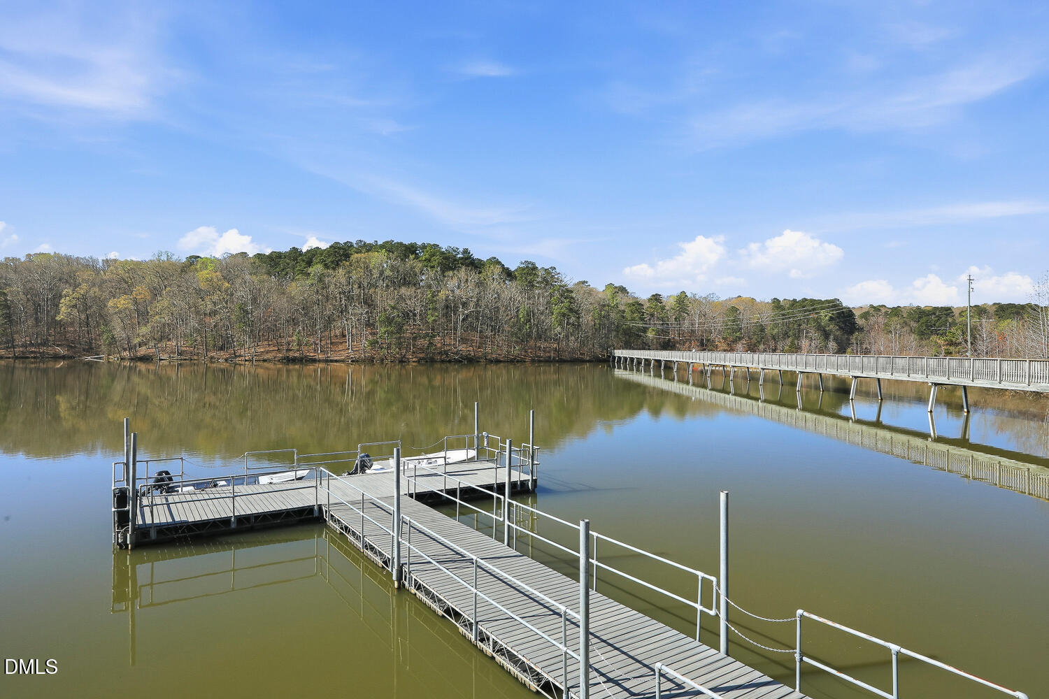 1220 Stoneferry Lane Raleigh, NC 27606 - Photo 30 of 40 a view of a lake with a large mountain