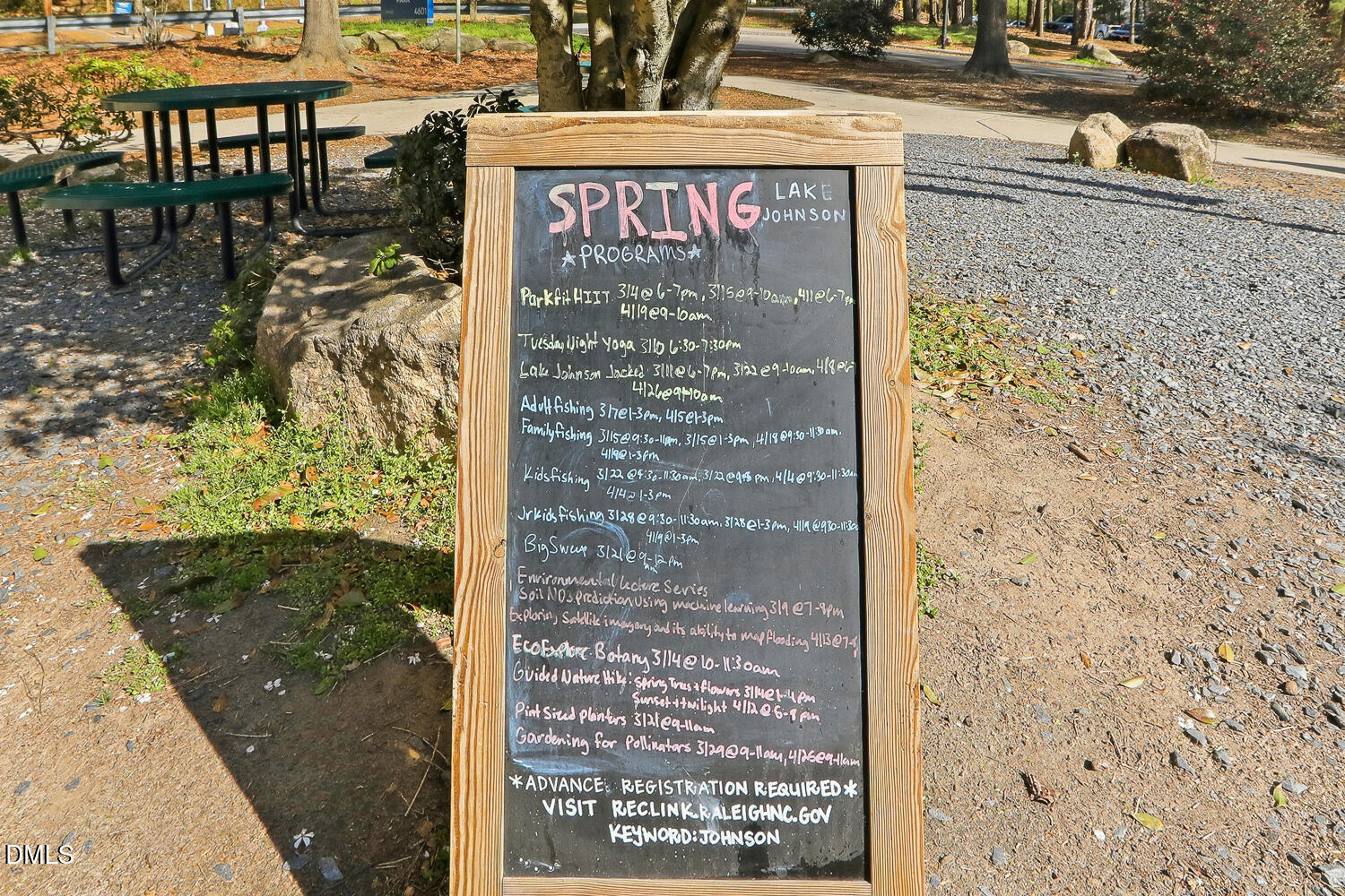 1220 Stoneferry Lane Raleigh, NC 27606 - Photo 33 of 40 a sign that is on a brick wall