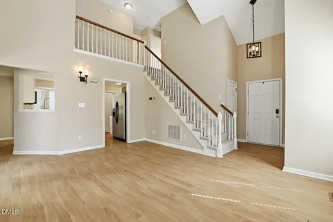a view of a hallway with staircase