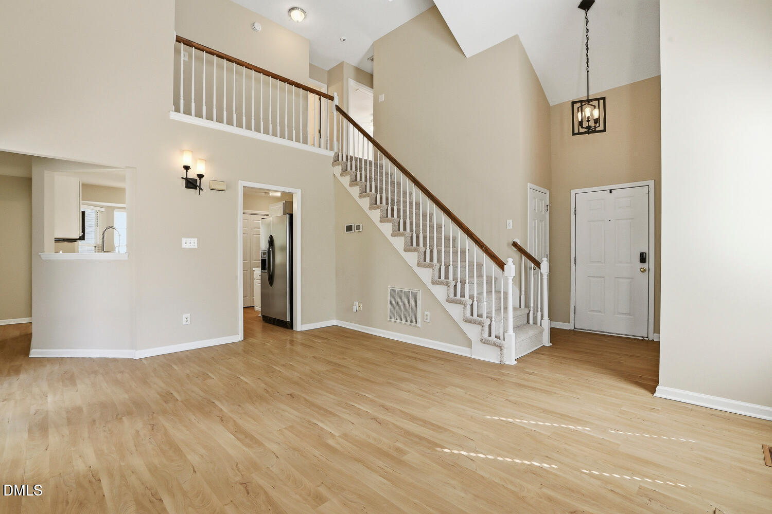 1220 Stoneferry Lane Raleigh, NC 27606 - Photo 5 of 40 a view of a hallway with staircase