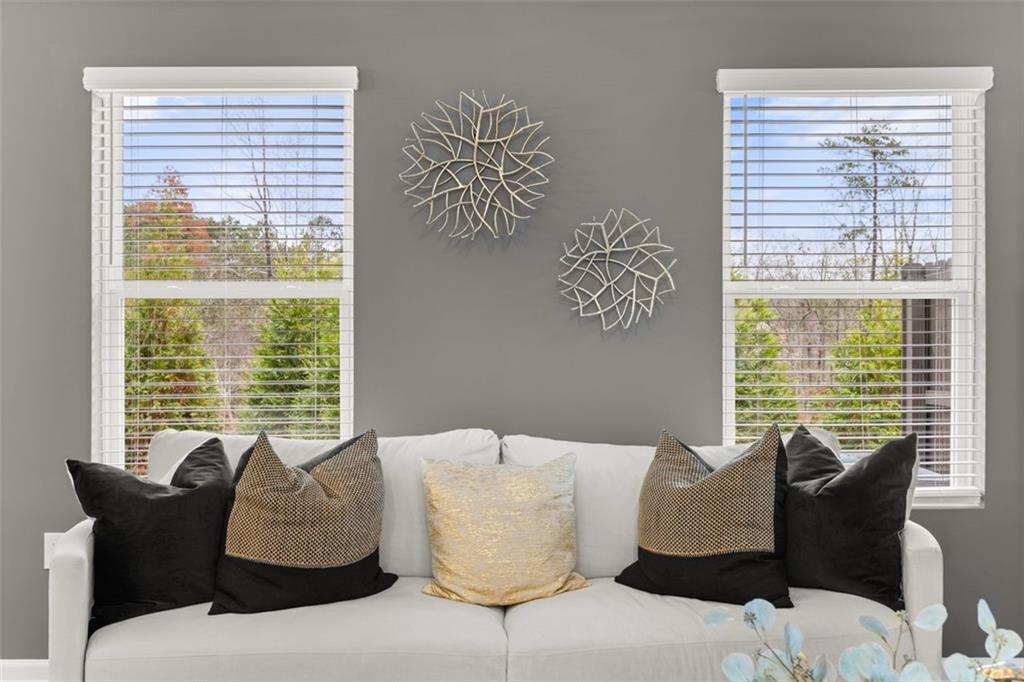 241 Epping Street, Unit 88 Stockbridge, GA 30281 - Photo 27 of 64 a living room with furniture and a large window