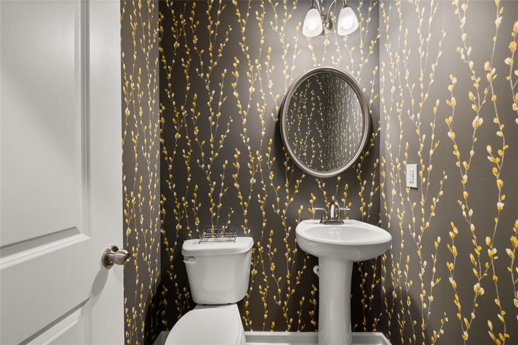 241 Epping Street, Unit 88 Stockbridge, GA 30281 - Photo 30 of 64 a bathroom with a sink and a mirror