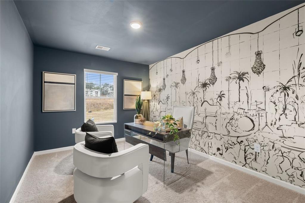 241 Epping Street, Unit 88 Stockbridge, GA 30281 - Photo 53 of 64 a living room with fireplace furniture and a potted plant