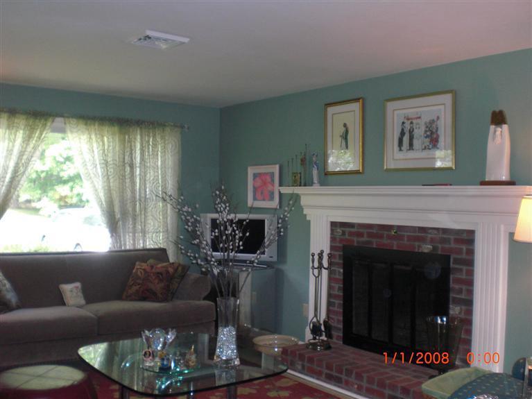 191 Camelback Road Marstons Mills, MA 02648 - Photo 3 of 18 a living room with furniture and a fireplace