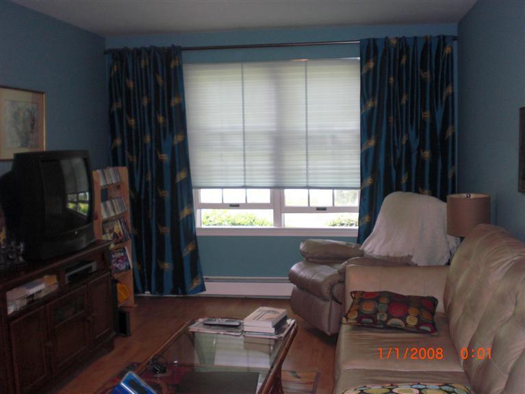 191 Camelback Road Marstons Mills, MA 02648 - Photo 10 of 18 a living room with furniture and a flat screen tv
