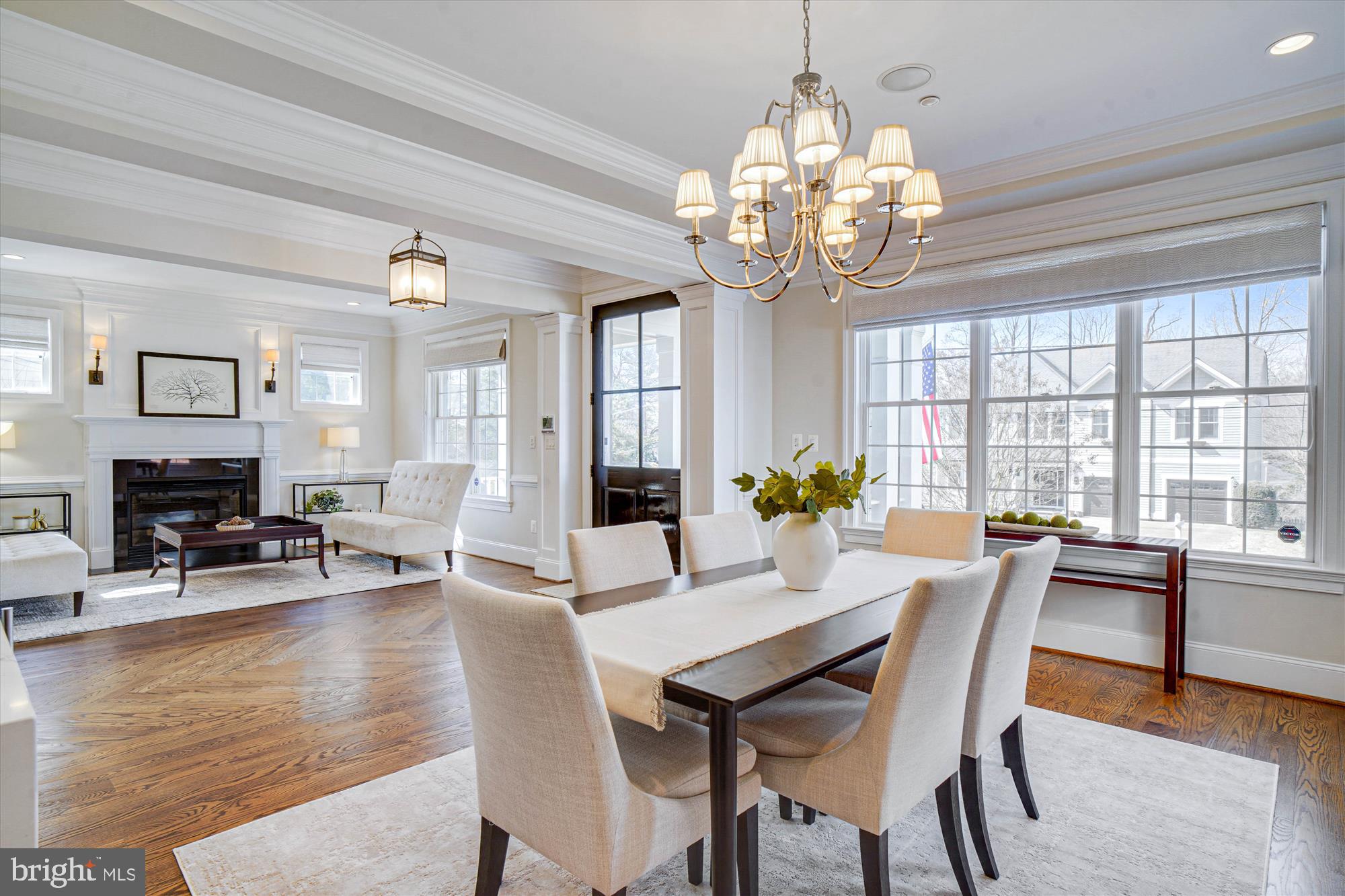 6603 Pyle Road Bethesda, MD 20817 - Photo 15 of 91 a view of a dining room with furniture a chandelier and wooden floor