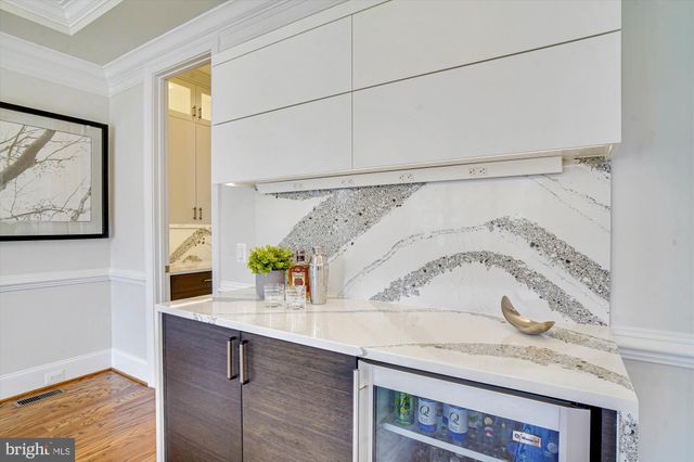 a kitchen with a sink stove and refrigerator