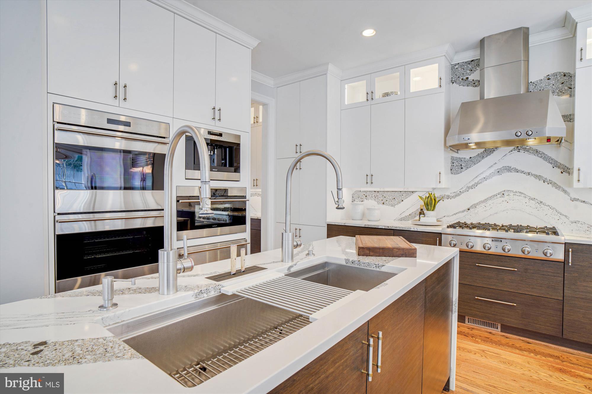 6603 Pyle Road Bethesda, MD 20817 - Photo 23 of 91 a kitchen with a sink stove and refrigerator