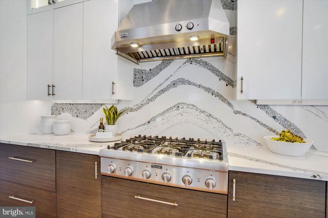 a view of a house with porch and wooden floor
