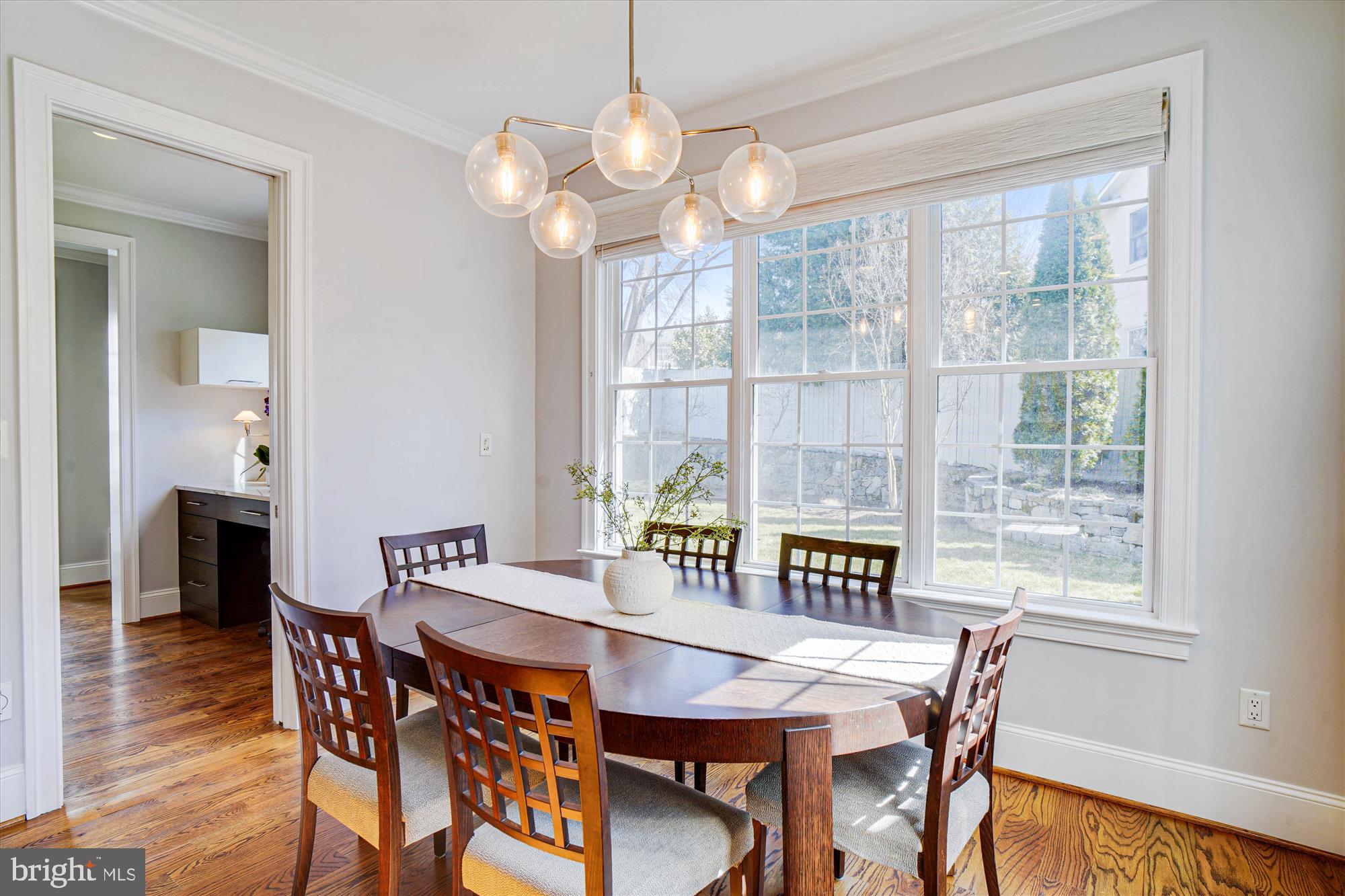 6603 Pyle Road Bethesda, MD 20817 - Photo 30 of 91 a view of a dining room with furniture window and wooden floor