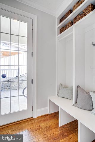 a utility room with sink dryer and washer