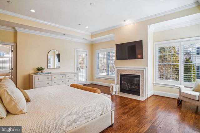 a view of an empty room and a window