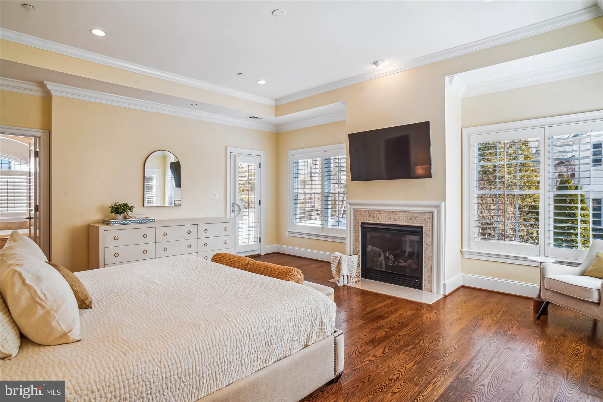 6603 Pyle Road Bethesda, MD 20817 - Photo 39 of 91 a spacious bedroom with a bed and a flat screen tv