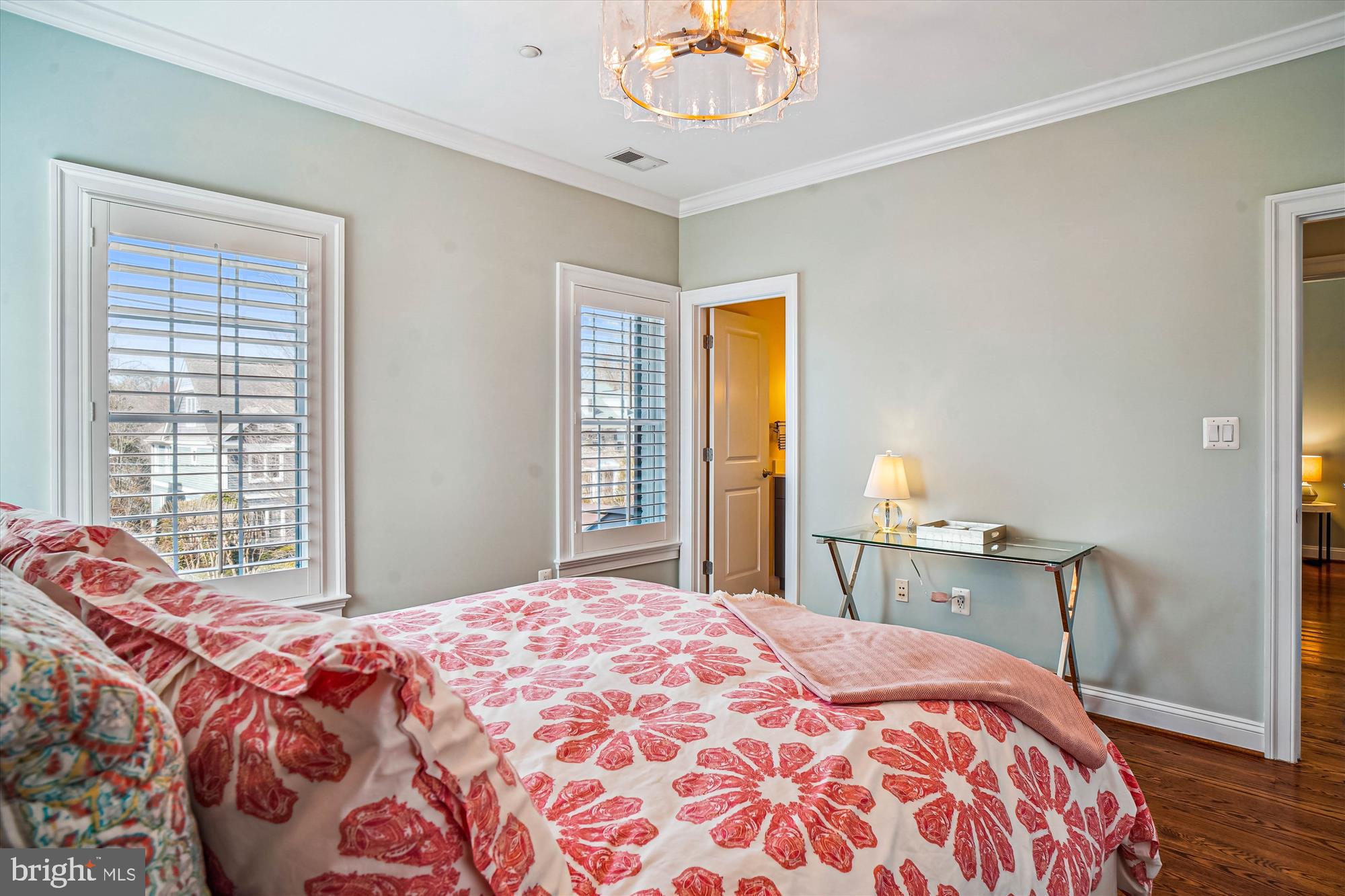 6603 Pyle Road Bethesda, MD 20817 - Photo 54 of 91 a bedroom with a bed and a chandelier