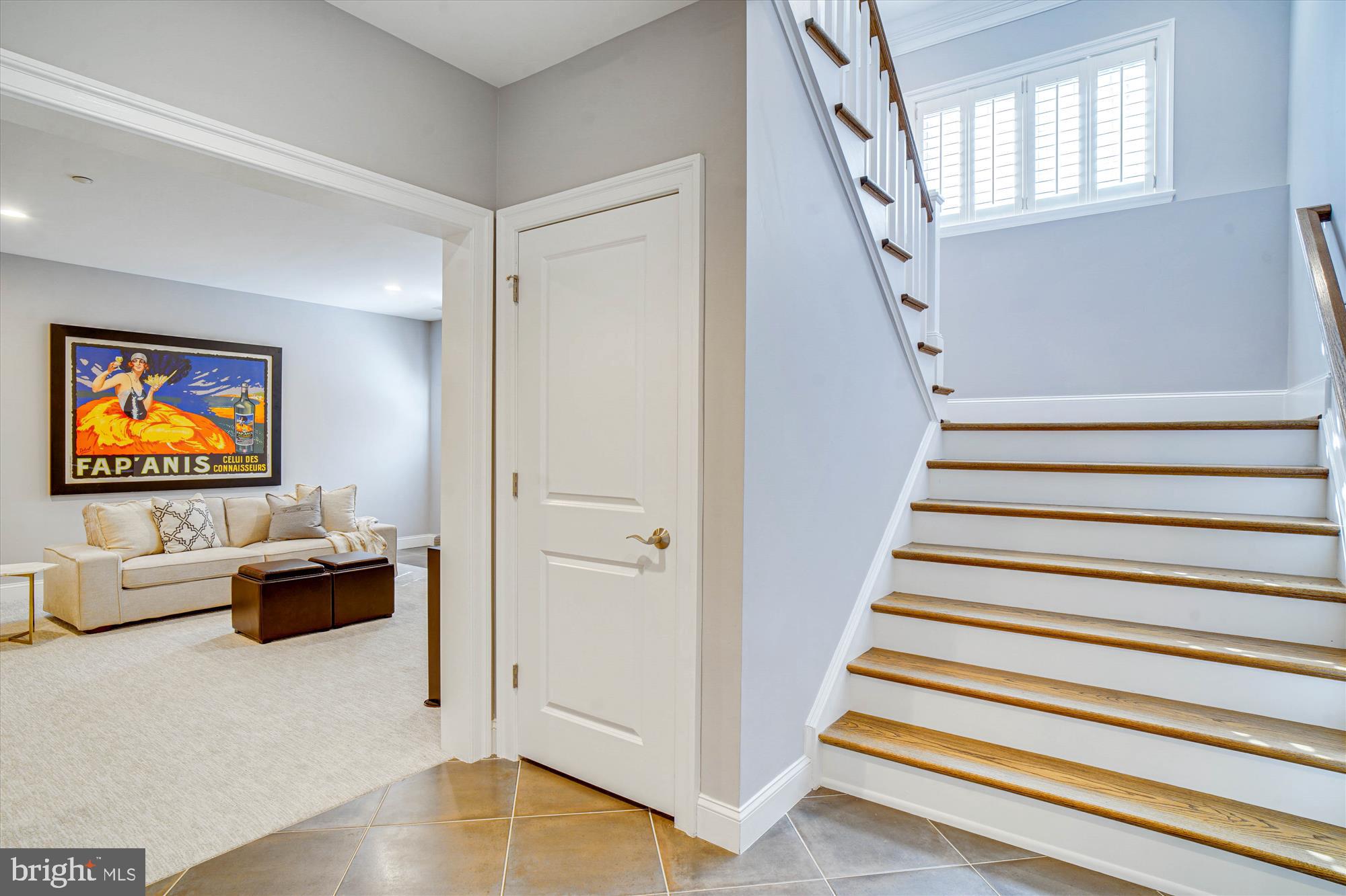 6603 Pyle Road Bethesda, MD 20817 - Photo 77 of 91 a view of hall way with furniture and stairs