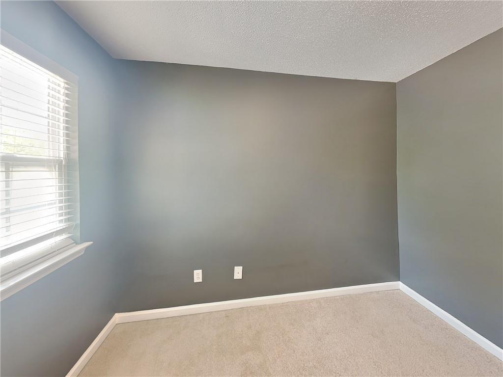 2157 Capella Circle Southwest Atlanta, GA 30331 - Photo 11 of 16 an empty room with a window