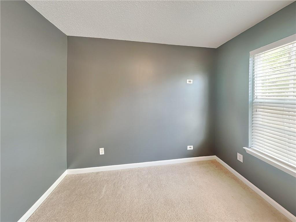 2157 Capella Circle Southwest Atlanta, GA 30331 - Photo 12 of 16 an empty room with a window