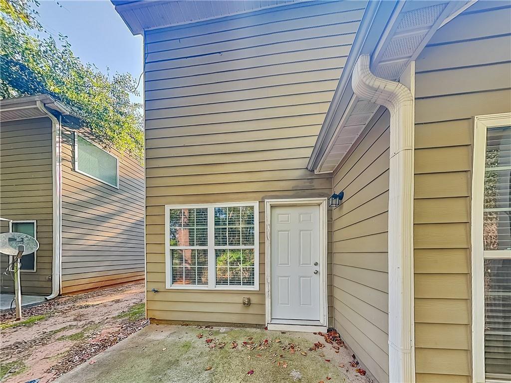 2157 Capella Circle Southwest Atlanta, GA 30331 - Photo 15 of 16 a front view of a house with a window