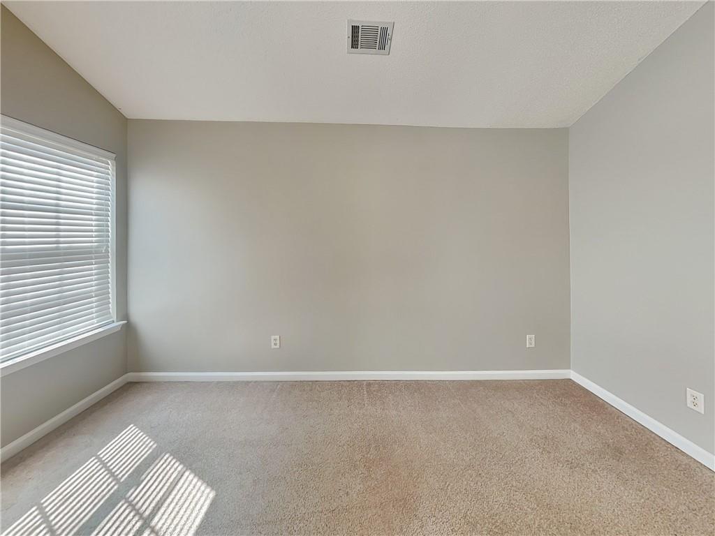 2157 Capella Circle Southwest Atlanta, GA 30331 - Photo 7 of 16 a view of an empty room with a window