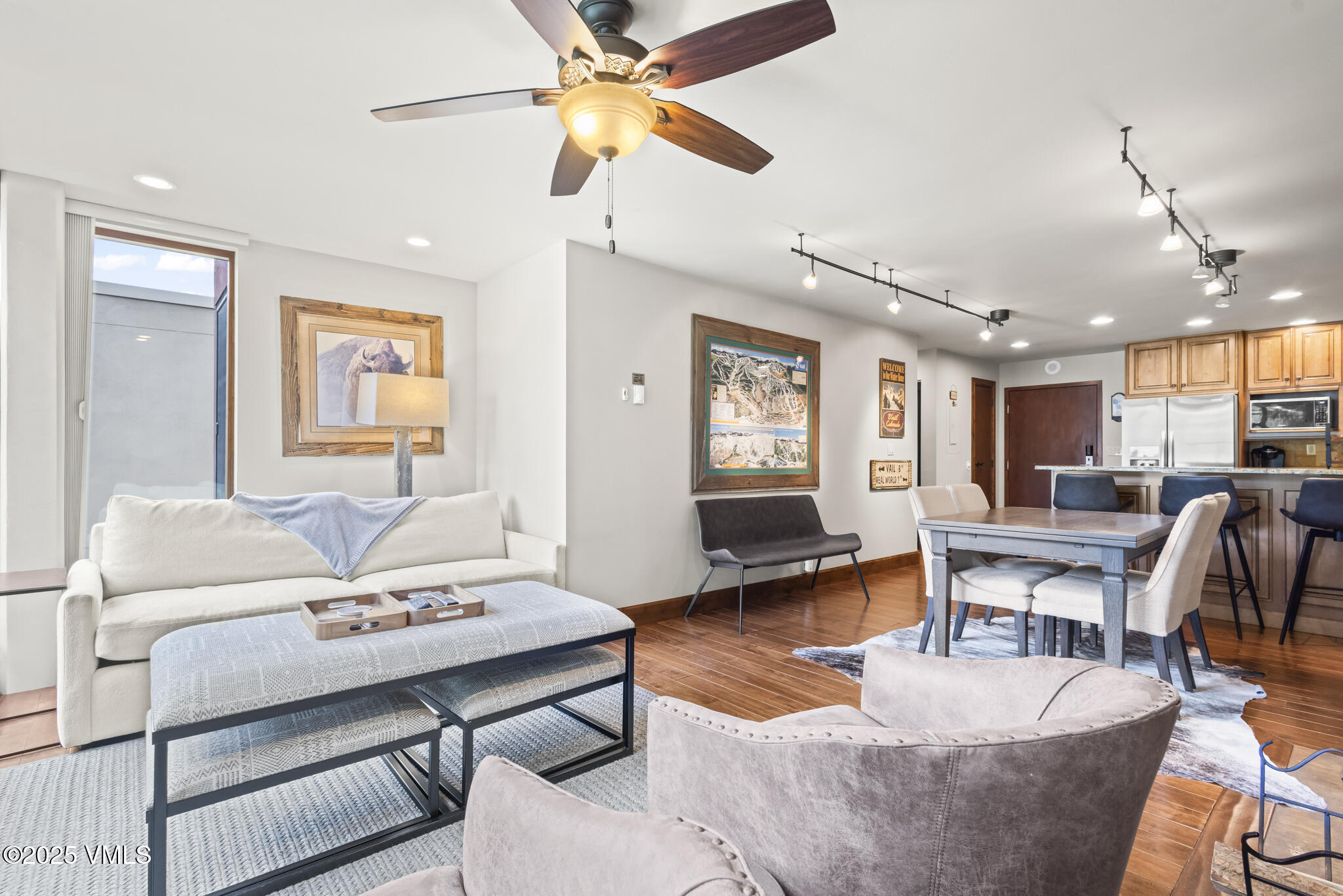 1100 North Frontage Road West, Unit 2504 Vail, CO 81657 - Photo 1 of 35 a living room with furniture and a wooden floor
