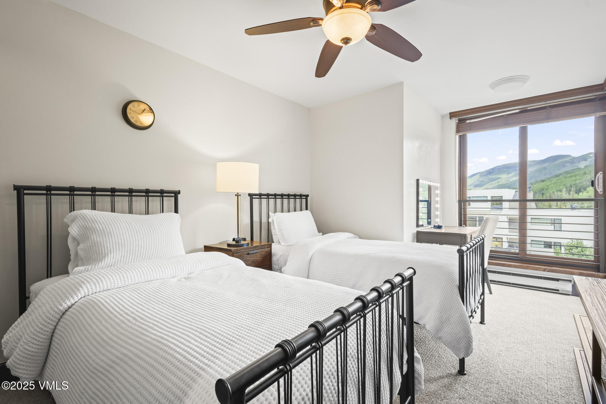 1100 North Frontage Road West, Unit 2504 Vail, CO 81657 - Photo 18 of 35 a bedroom with double bed and a large window