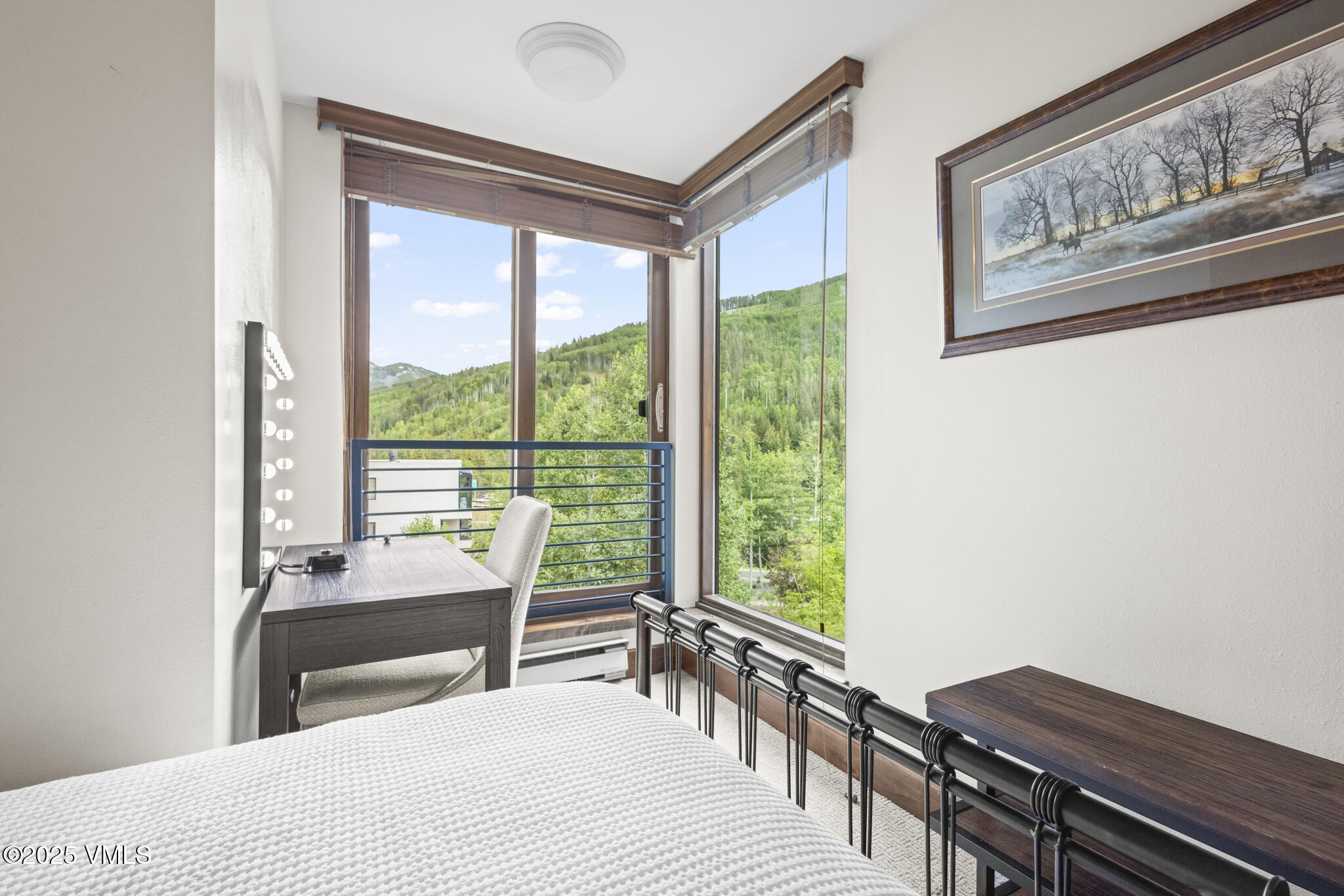 1100 North Frontage Road West, Unit 2504 Vail, CO 81657 - Photo 20 of 35 a room with a bed and a large window