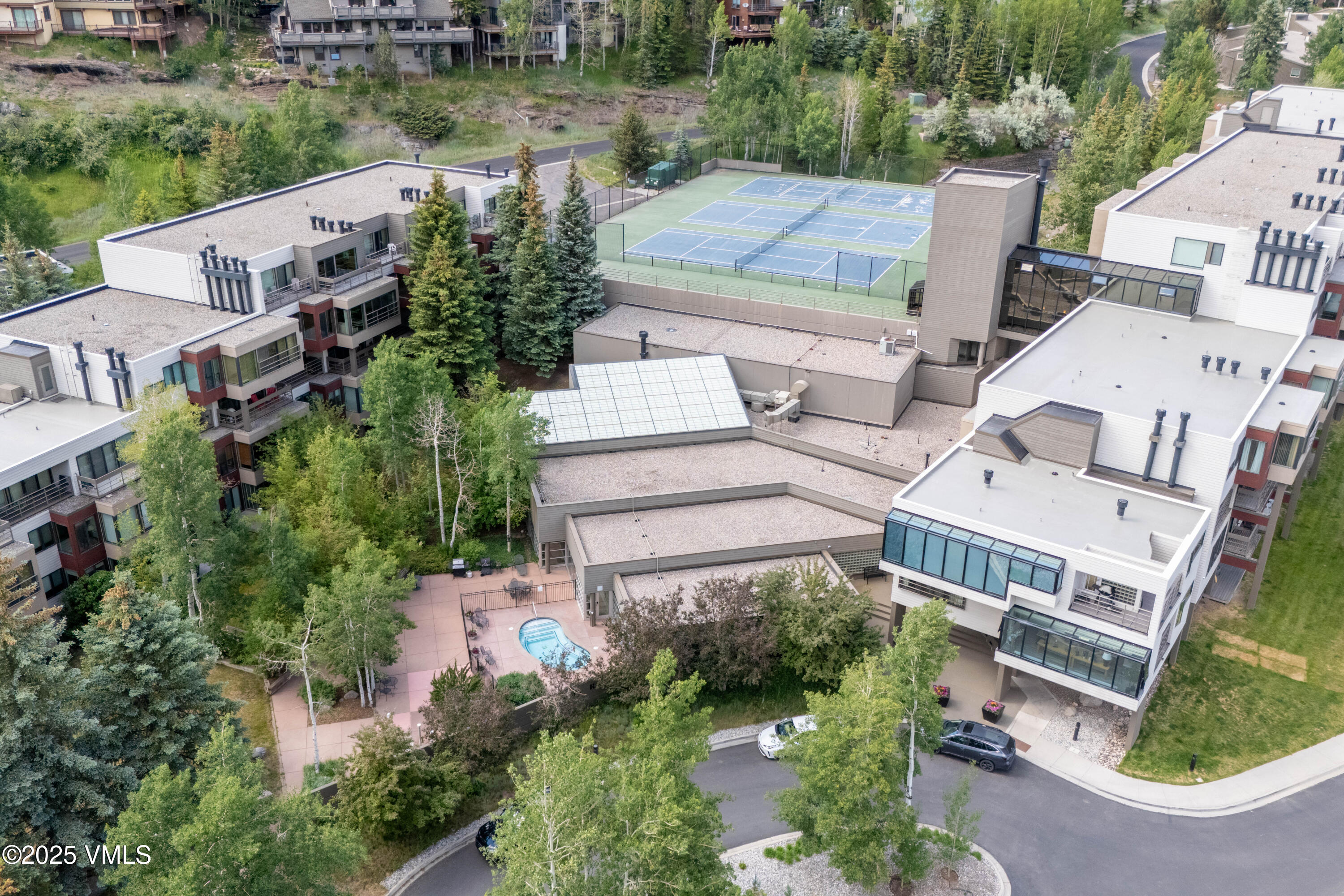 1100 North Frontage Road West, Unit 2504 Vail, CO 81657 - Photo 2 of 35 an aerial view of a house with outdoor space and lake view