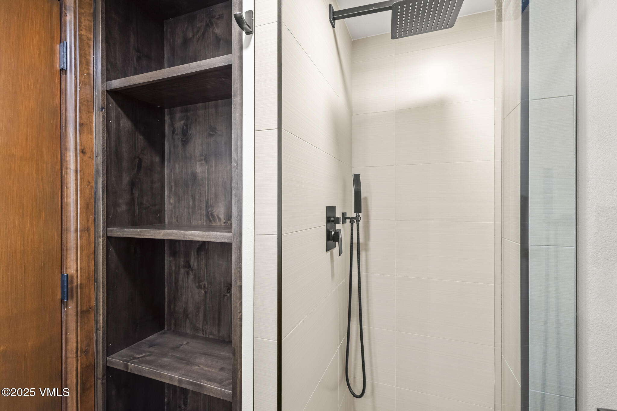 1100 North Frontage Road West, Unit 2504 Vail, CO 81657 - Photo 22 of 35 a bathroom with a granite countertop shower