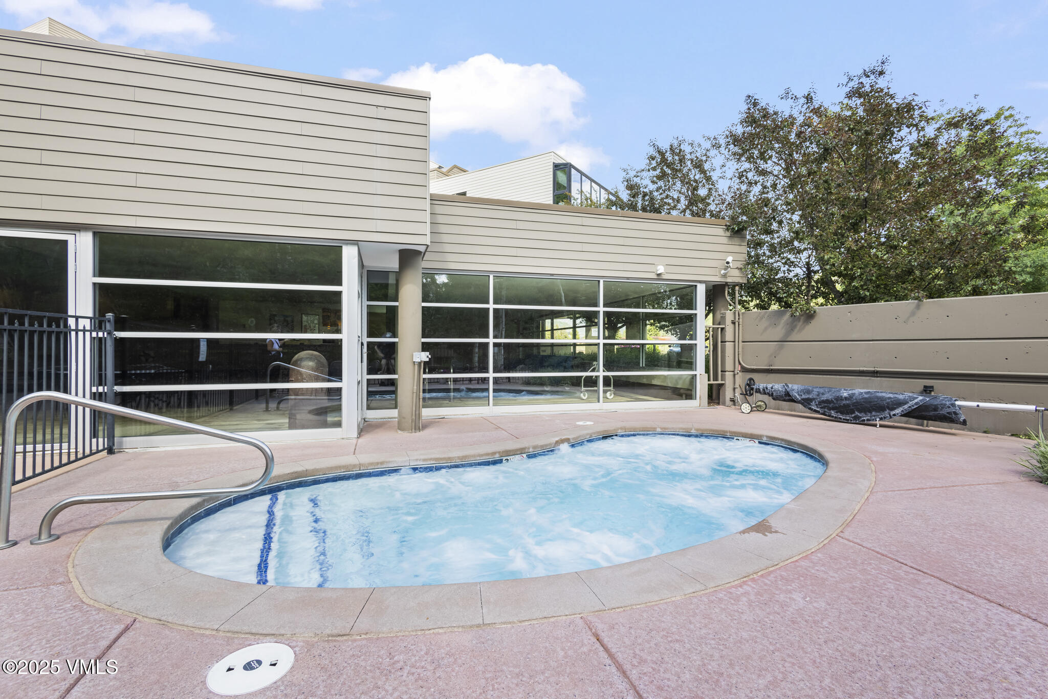 1100 North Frontage Road West, Unit 2504 Vail, CO 81657 - Photo 28 of 35 a view of a house with swimming pool and sitting area