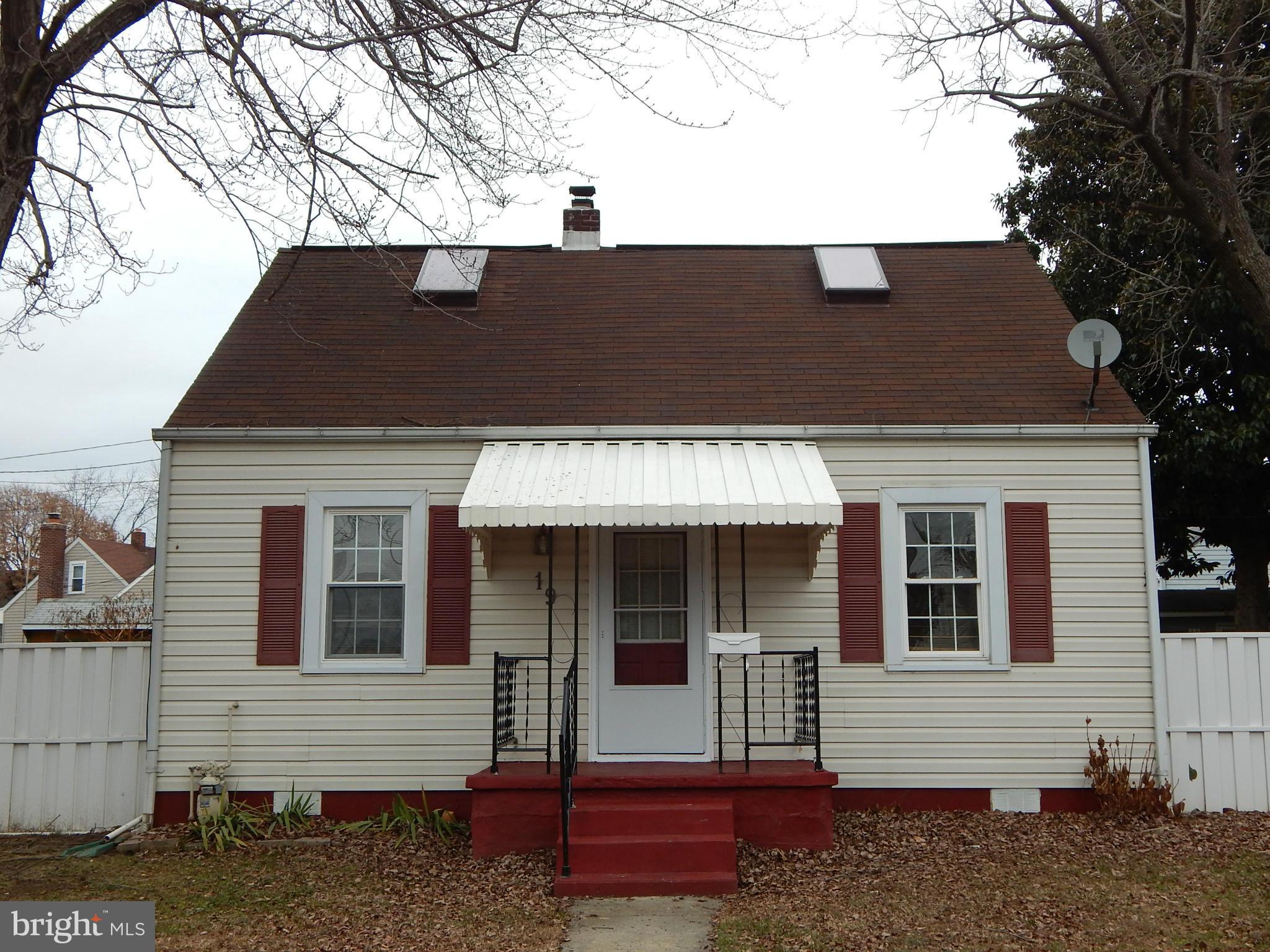 19 Riverside Road Essex, MD 21221 - Photo 1 of 16 a front view of a house with a porch