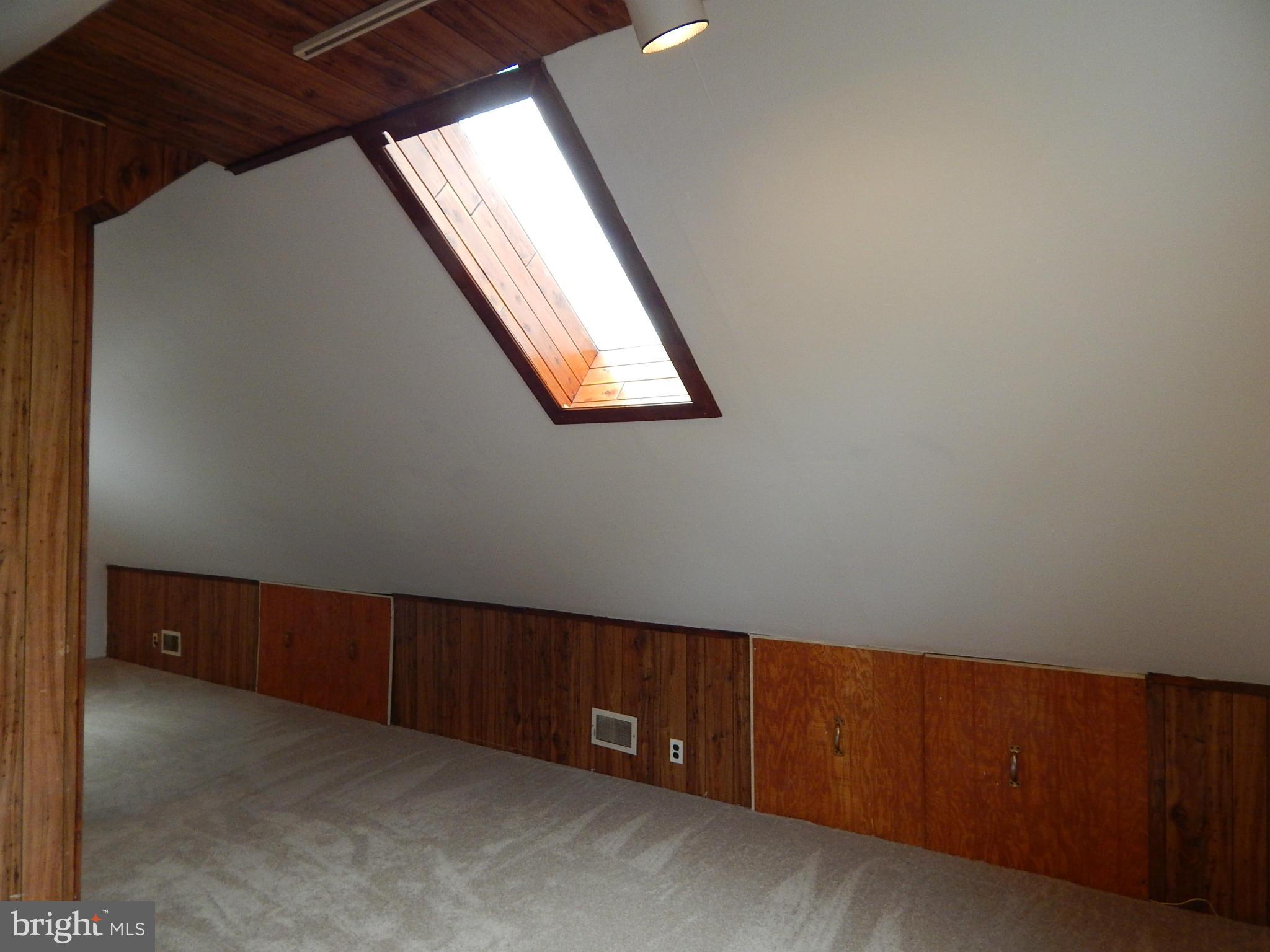 19 Riverside Road Essex, MD 21221 - Photo 13 of 16 an empty room with windows