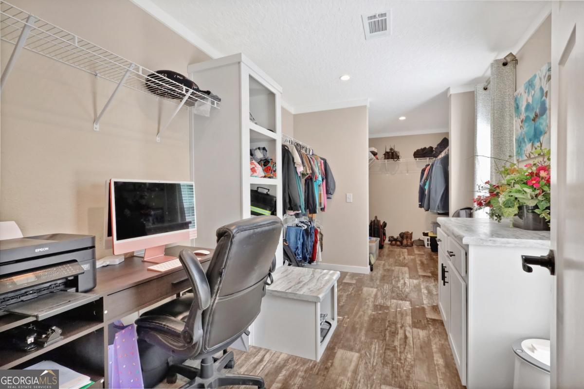 2505 Odum Road South Screven, GA 31560 - Photo 12 of 55 a living room with furniture a flat screen tv and a window