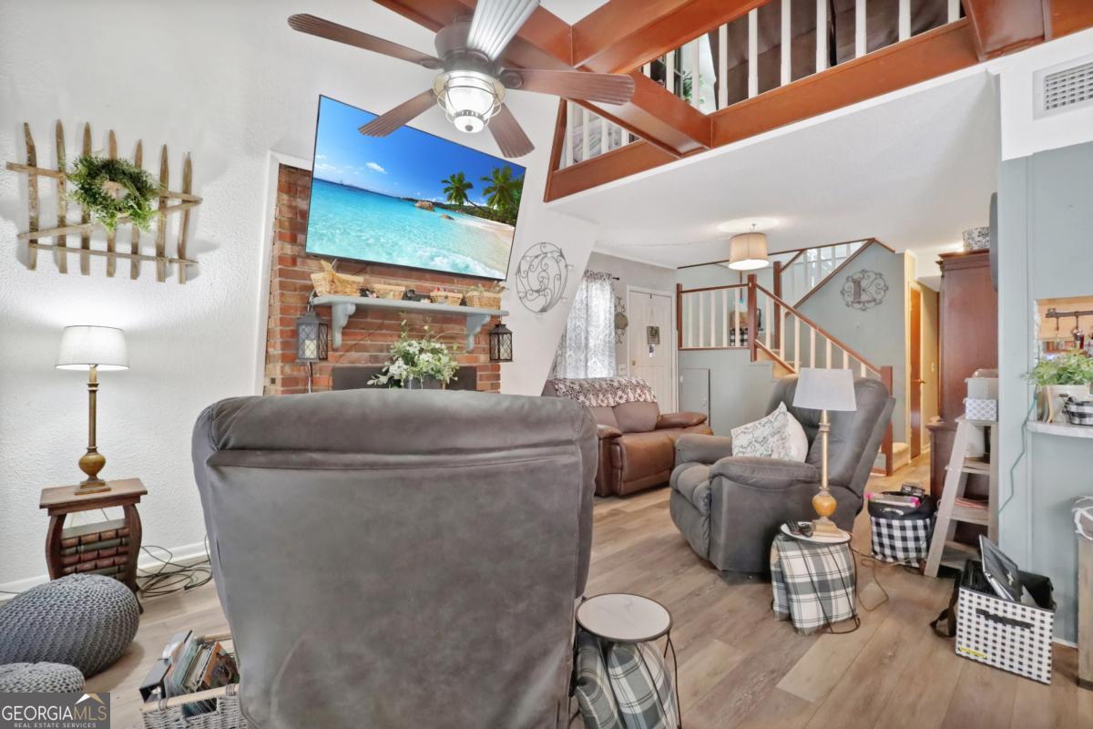 2505 Odum Road South Screven, GA 31560 - Photo 18 of 55 a living room with furniture and wooden floor