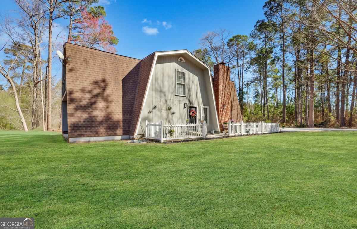 2505 Odum Road South Screven, GA 31560 - Photo 2 of 55 a view of a tiny house with a park