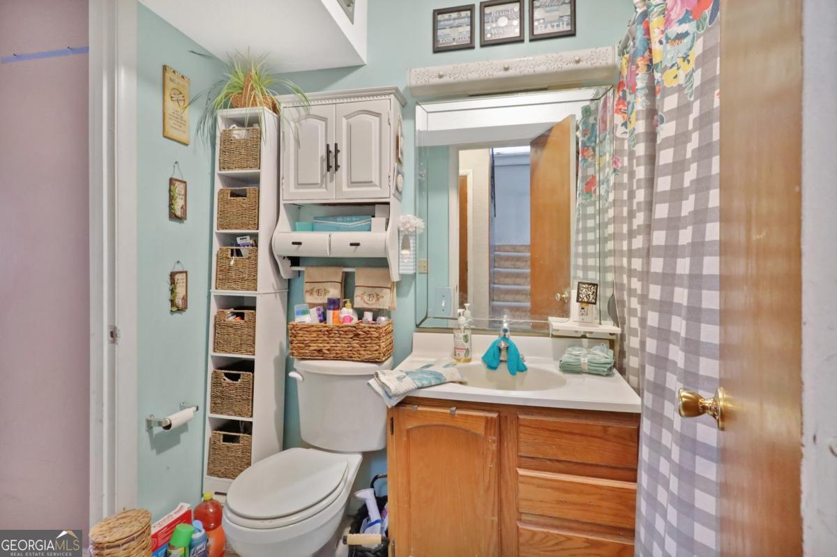 2505 Odum Road South Screven, GA 31560 - Photo 32 of 55 a bathroom with a sink a toilet and shower