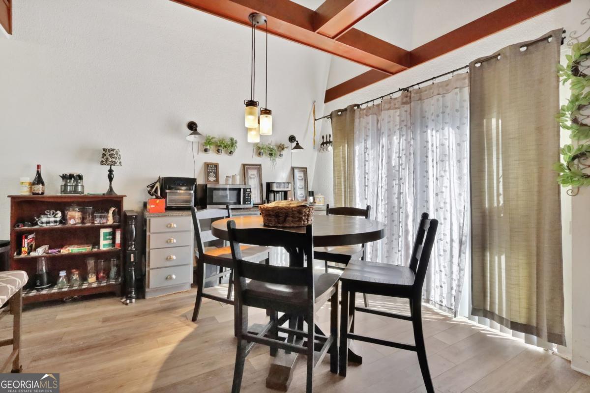 2505 Odum Road South Screven, GA 31560 - Photo 34 of 55 a view of a dining room with furniture and chandelier