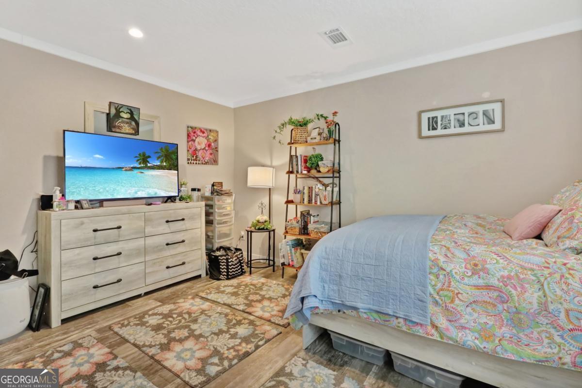 2505 Odum Road South Screven, GA 31560 - Photo 49 of 55 a bedroom with a bed and furniture