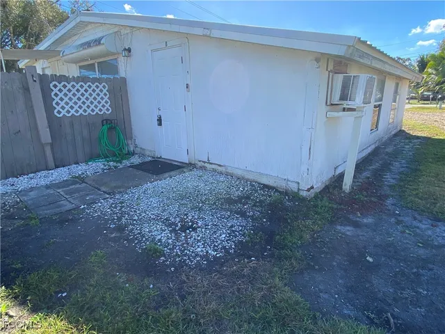 a view of a backyard of a house
