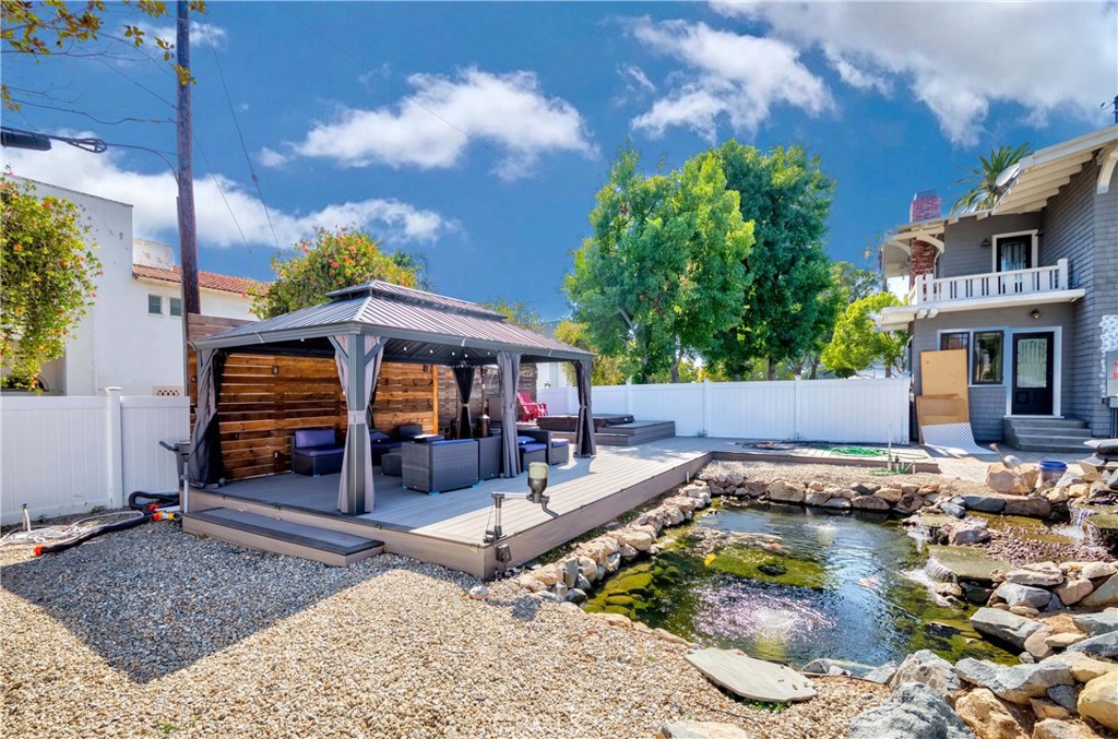 6554 Friends Avenue Whittier, CA 90601 - Photo 11 of 16 a view of a house with backyard porch and sitting area